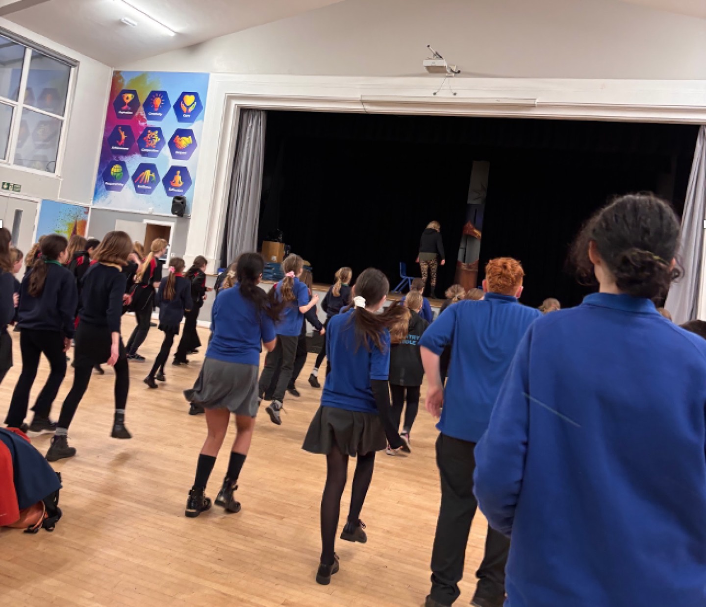 Newminster and Chantry pupils learning the routine with Miss Kelly